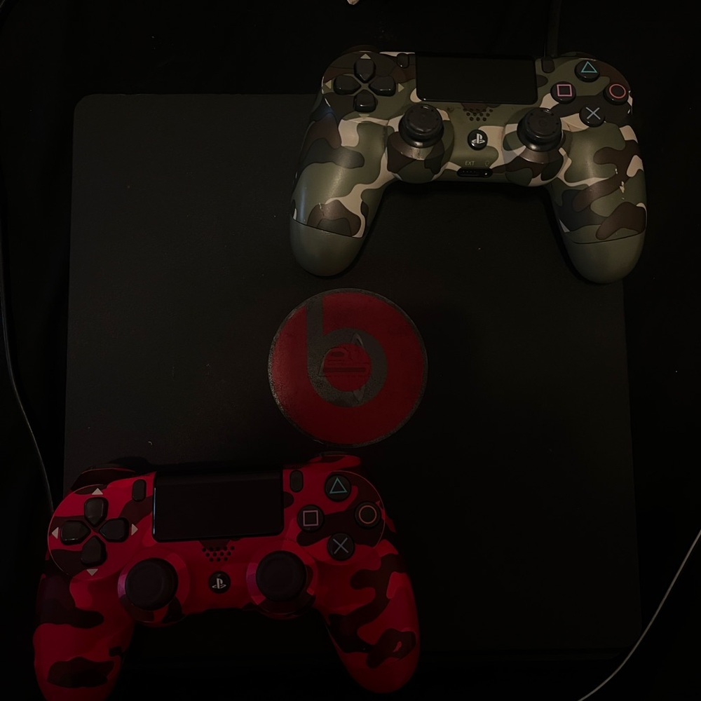 PS4 w/ two brand new camouflage controllers